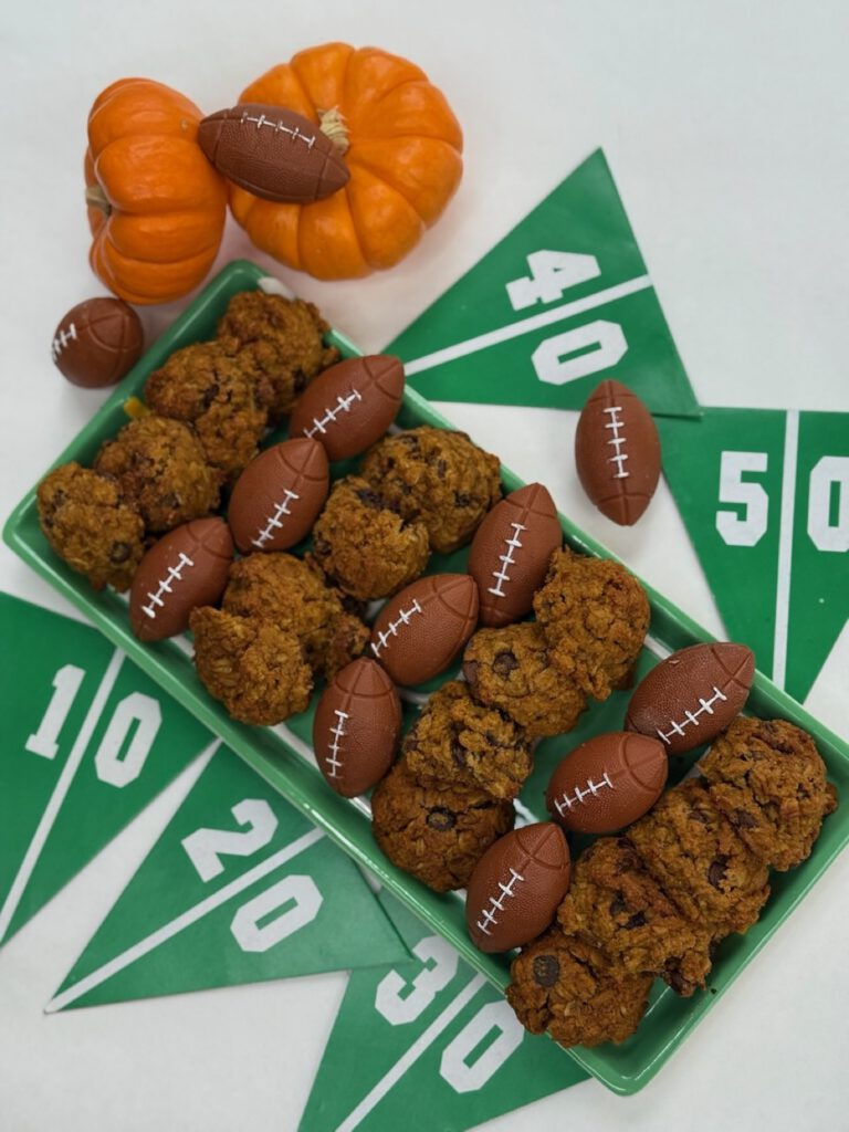 Iced game-day cookies on a serving tray