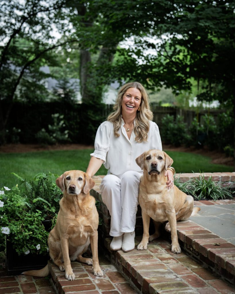 Christie-Leigh Wells with her dogs, Henry and Jeudy