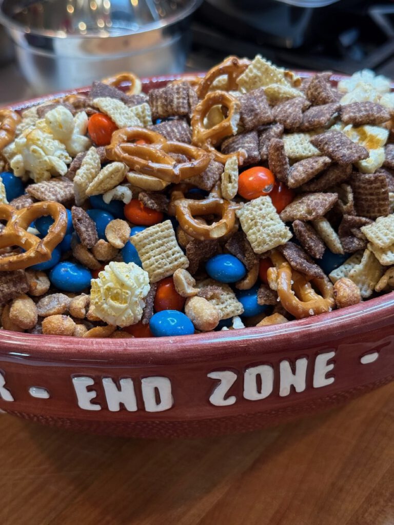 Game-day snack mix in a footed bowl